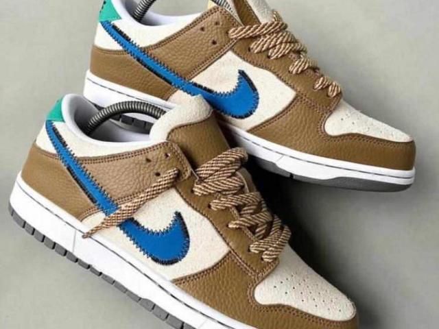 Nike Dunk lows - Cream and Gold with Blue Swoosh - 1