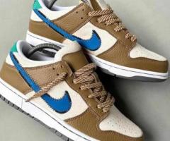 Nike Dunk lows - Cream and Gold with Blue Swoosh